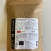 Rückseite einer Kaffeetüte mit Infos zu Sorte, Herkunft und Röstung des Bio-Kaffees „Caffè Crema“. Text zur Zusammenarbeit mit der Regionalwert AG Münsterland. Hersteller ist die Lenis GmbH aus Gronau-Epe. Unten sind Bio- und Recycling-Symbole sowie das Mindesthaltbarkeitsdatum: 30. Juni 2026.